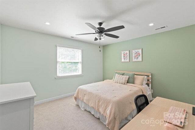 bedroom featuring visible vents, recessed lighting, ceiling fan, and light colored carpet