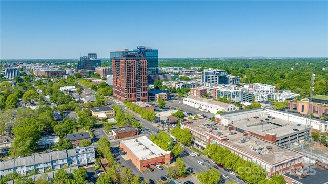 birds eye view of property with a view of city
