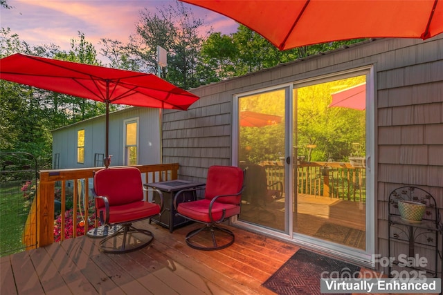 743 Dream Ln, Salisbury, NC 28146 - deck at dusk with outdoor dining area