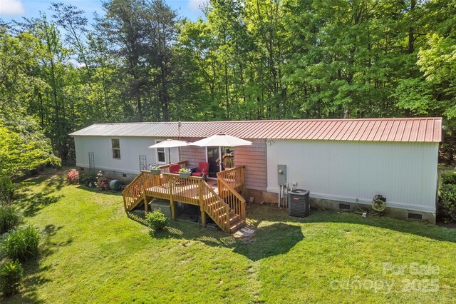 743 Dream Ln, Salisbury, NC 28146 - back of property with crawl space, metal roof, a lawn, a wooden deck, and stairway