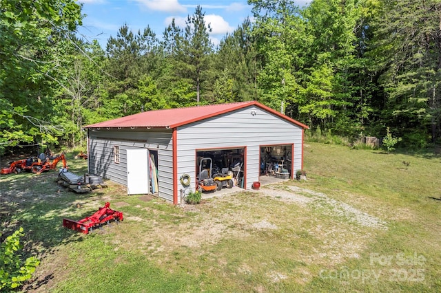 743 Dream Ln, Salisbury, NC 28146 - detached garage with a view of trees