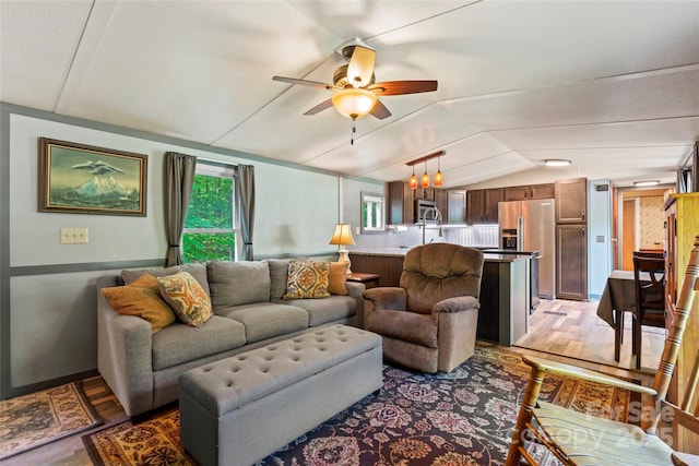 743 Dream Ln, Salisbury, NC 28146 - living room with light wood-style flooring, ceiling fan, and lofted ceiling
