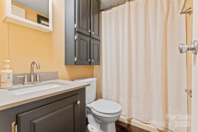 743 Dream Ln, Salisbury, NC 28146 - bathroom featuring vanity, a shower with curtain, and toilet