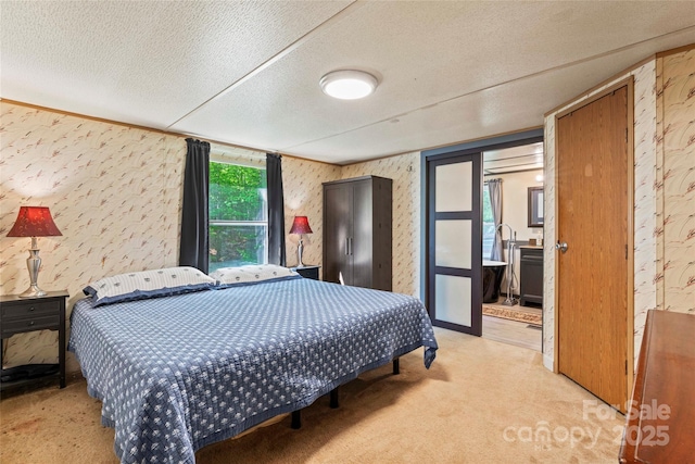 743 Dream Ln, Salisbury, NC 28146 - bedroom with a textured ceiling, wallpapered walls, and light colored carpet