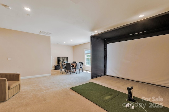 cinema with visible vents, baseboards, light colored carpet, recessed lighting, and golf simulator