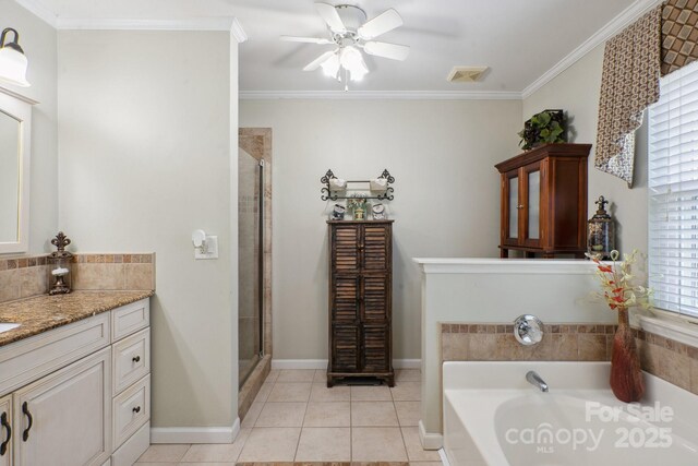 full bath featuring vanity, ceiling fan, a garden tub, and a stall shower