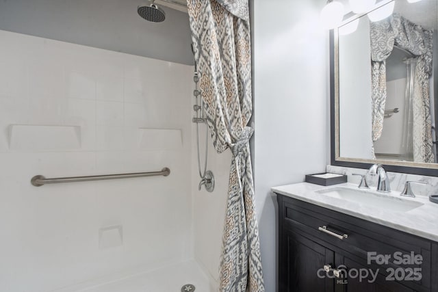 full bathroom featuring vanity and curtained shower