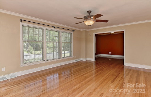 385 Gum Branch Rd, Charlotte, NC 28214 - empty room featuring ornamental molding, wood finished floors, and visible vents