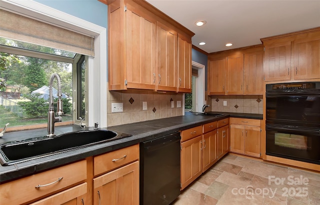 385 Gum Branch Rd, Charlotte, NC 28214 - kitchen featuring a sink, dark countertops, backsplash, and black appliances