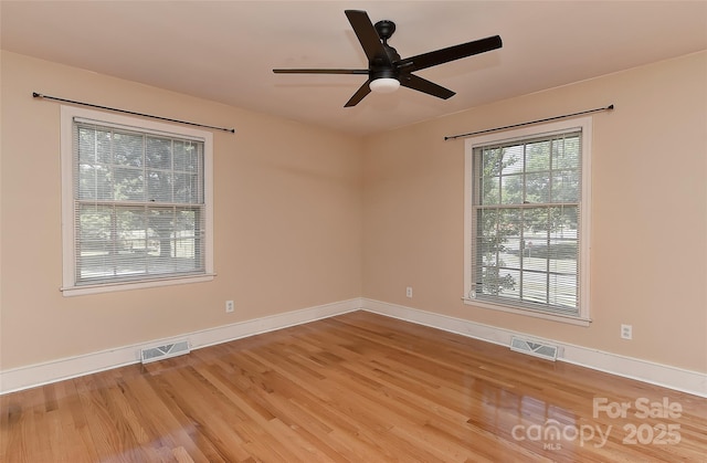 385 Gum Branch Rd, Charlotte, NC 28214 - spare room with visible vents, baseboards, ceiling fan, and wood finished floors