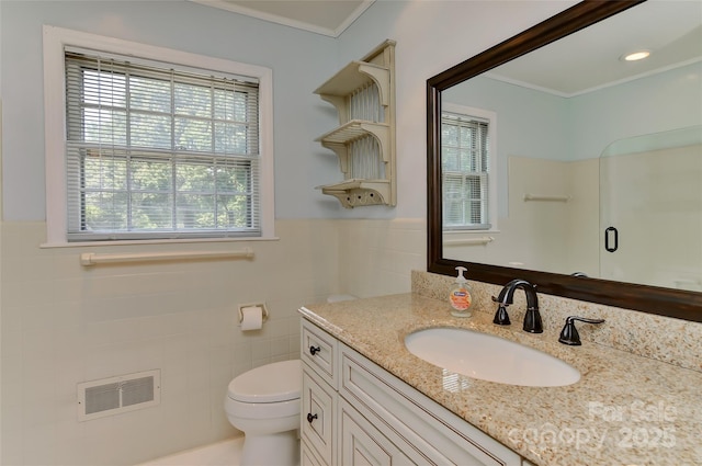 385 Gum Branch Rd, Charlotte, NC 28214 - full bath featuring visible vents, ornamental molding, wainscoting, a shower, and toilet