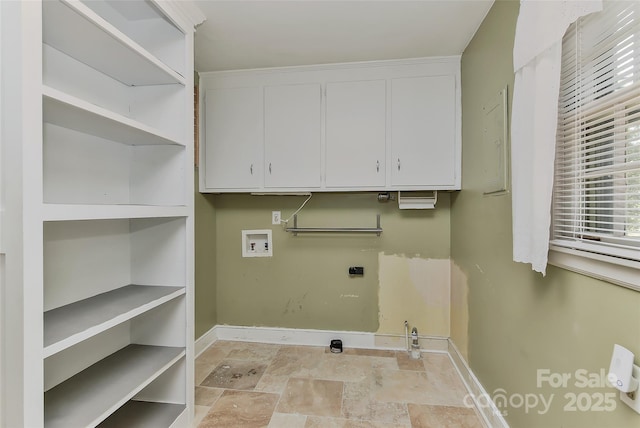 385 Gum Branch Rd, Charlotte, NC 28214 - clothes washing area with cabinet space, hookup for a washing machine, stone finish floor, baseboards, and hookup for an electric dryer