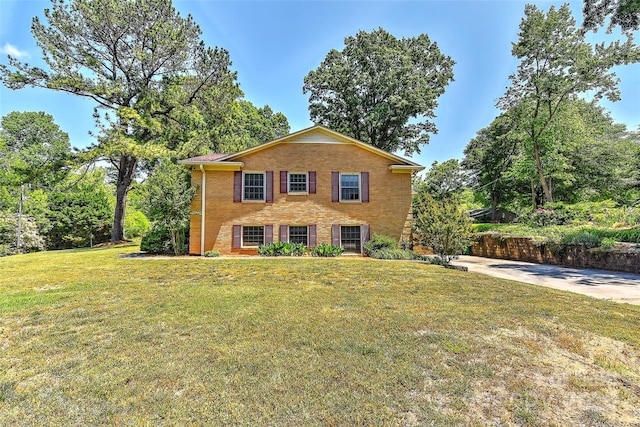 385 Gum Branch Rd, Charlotte, NC 28214 - view of front of home with brick siding and a front yard