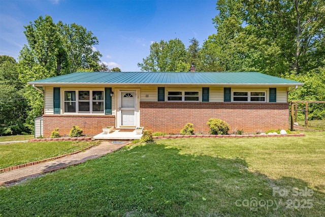 111 Baxter St, Morganton, NC 28655 - ranch-style home with fence, brick siding, a front yard, a chimney, and metal roof