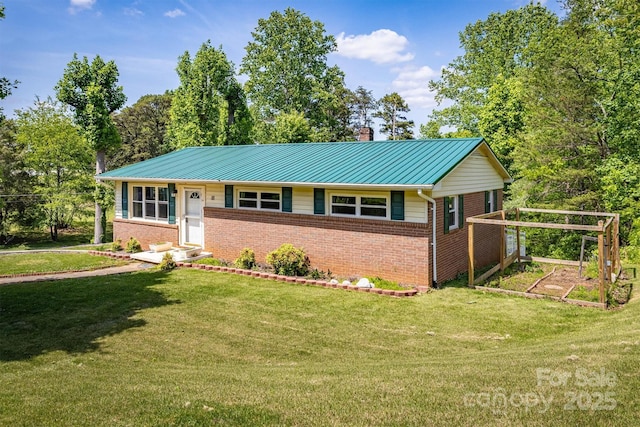 111 Baxter St, Morganton, NC 28655 - ranch-style house with brick siding, a chimney, metal roof, and a front lawn