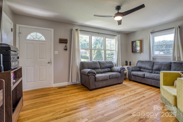 111 Baxter St, Morganton, NC 28655 - living room featuring a ceiling fan, light wood-style flooring, and a wealth of natural light