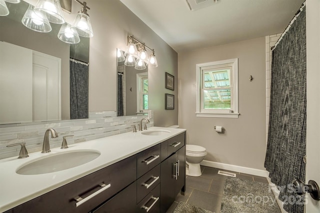 111 Baxter St, Morganton, NC 28655 - bathroom with a sink, tile patterned floors, toilet, and visible vents
