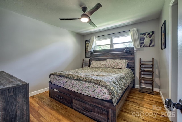 111 Baxter St, Morganton, NC 28655 - bedroom featuring baseboards, ceiling fan, and wood finished floors