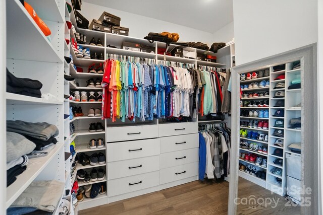 1005 Grand Oak Dr, Waxhaw, NC 28173 - spacious closet featuring wood finished floors