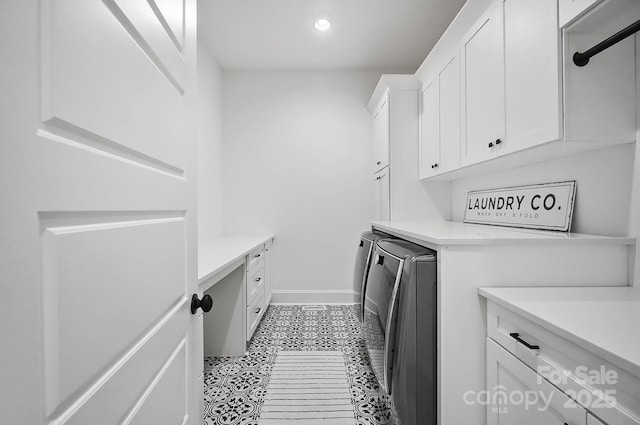 1005 Grand Oak Dr, Waxhaw, NC 28173 - laundry room with washer and dryer, cabinet space, recessed lighting, baseboards, and light tile patterned floors