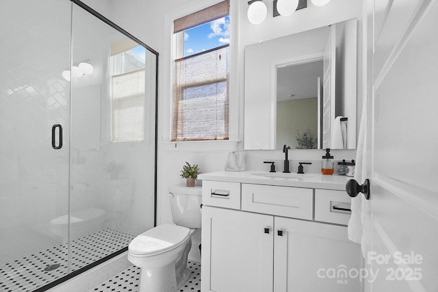 1005 Grand Oak Dr, Waxhaw, NC 28173 - bathroom with toilet, vanity, a shower stall, and tile patterned flooring