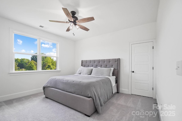 1005 Grand Oak Dr, Waxhaw, NC 28173 - carpeted bedroom featuring baseboards and ceiling fan