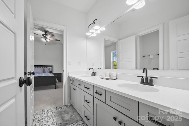 1005 Grand Oak Dr, Waxhaw, NC 28173 - ensuite bathroom featuring double vanity and a ceiling fan