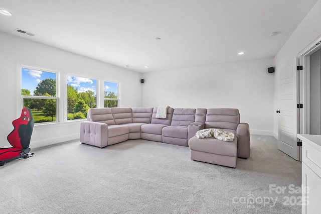 1005 Grand Oak Dr, Waxhaw, NC 28173 - carpeted living room featuring baseboards and recessed lighting