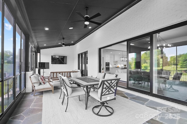1005 Grand Oak Dr, Waxhaw, NC 28173 - sunroom with a chandelier