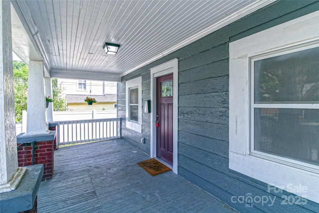 wooden deck featuring a porch