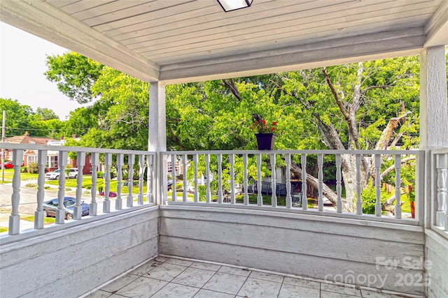 view of patio with a balcony
