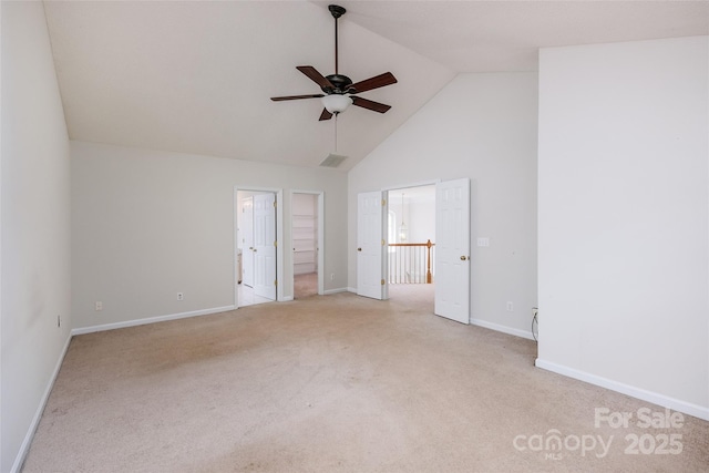 16017 Woodcote Dr, Huntersville, NC 28078 - unfurnished bedroom with high vaulted ceiling, light carpet, baseboards, a walk in closet, and ceiling fan