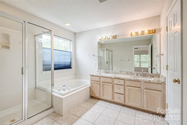 16017 Woodcote Dr, Huntersville, NC 28078 - full bath with a bath, healthy amount of natural light, double vanity, a stall shower, and a textured ceiling