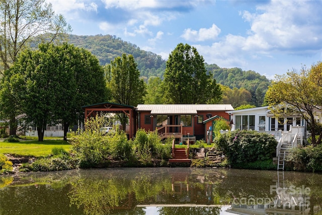 214 Pike Pt, Waynesville, NC 28785 - back of property featuring a gazebo, metal roof, stairs, and a deck with water view