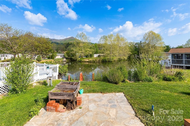 214 Pike Pt, Waynesville, NC 28785 - view of yard featuring a garden and a water and mountain view