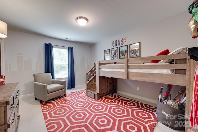 bedroom featuring baseboards