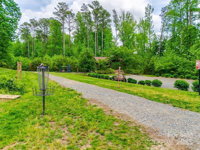 surrounding community featuring a yard