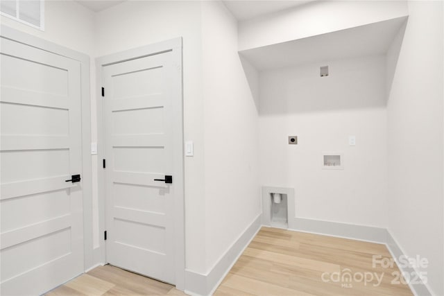 124 Clipper Ln, Mooresville, NC 28117 - laundry room with hookup for an electric dryer, light wood-type flooring, hookup for a washing machine, and baseboards