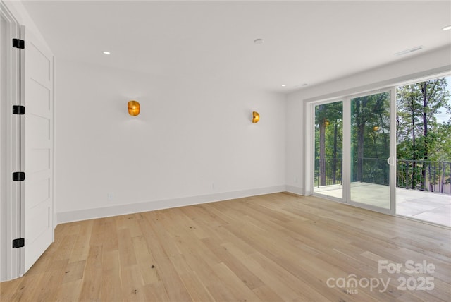 124 Clipper Ln, Mooresville, NC 28117 - unfurnished room featuring light wood-type flooring, baseboards, and recessed lighting
