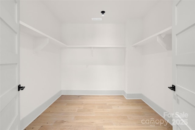 124 Clipper Ln, Mooresville, NC 28117 - spacious closet featuring light wood-type flooring