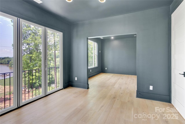 124 Clipper Ln, Mooresville, NC 28117 - unfurnished room featuring wood finished floors and baseboards
