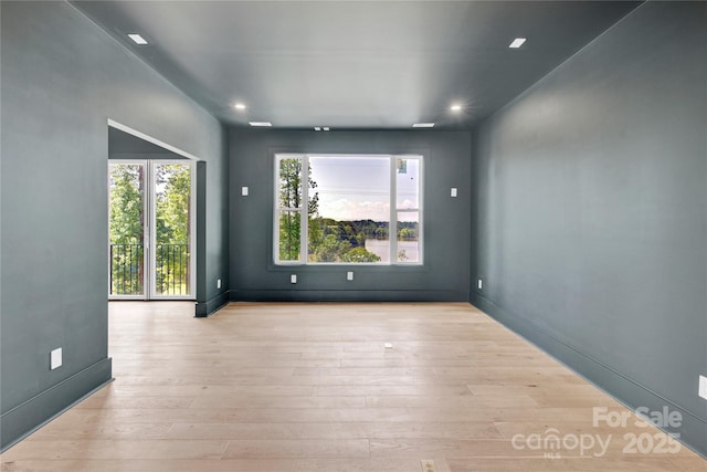124 Clipper Ln, Mooresville, NC 28117 - empty room featuring wood finished floors, recessed lighting, and baseboards