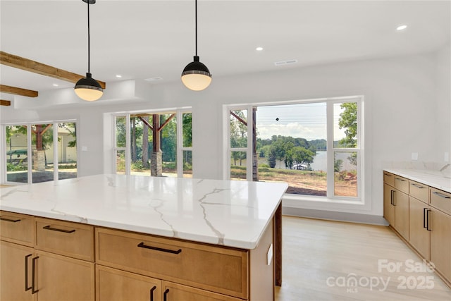 124 Clipper Ln, Mooresville, NC 28117 - kitchen with light stone countertops, recessed lighting, plenty of natural light, and hanging light fixtures