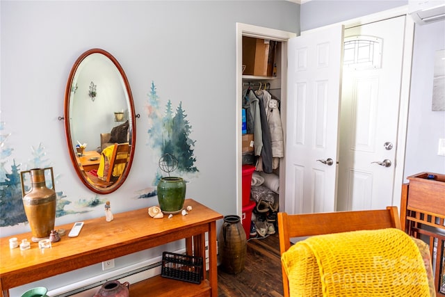 57 Gribble Rd, Franklin, NC 28734 - bedroom featuring a wall unit AC and wood finished floors