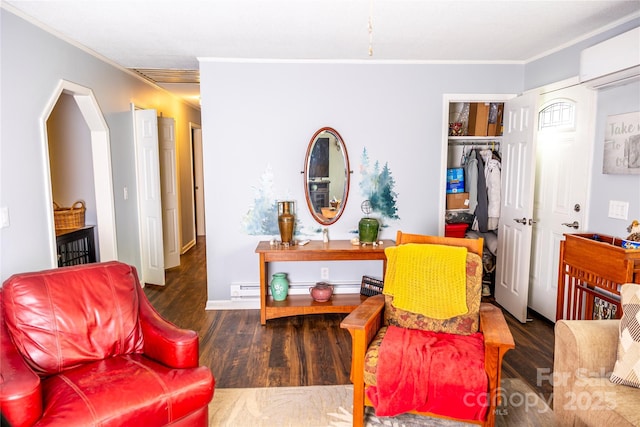 57 Gribble Rd, Franklin, NC 28734 - living room featuring ornamental molding, wood finished floors, and a baseboard heating unit