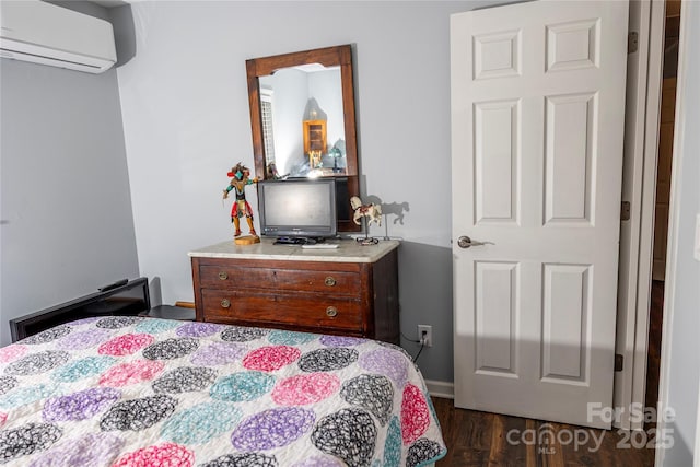 57 Gribble Rd, Franklin, NC 28734 - bedroom with a wall mounted air conditioner and dark wood-style flooring