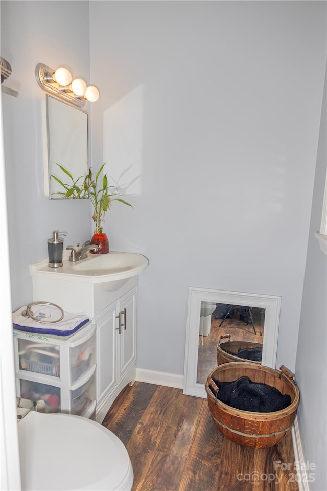 57 Gribble Rd, Franklin, NC 28734 - bathroom with vanity, wood finished floors, and baseboards