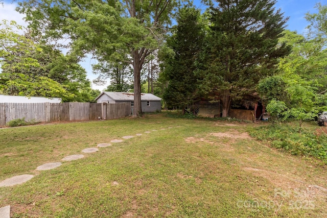 view of yard with fence