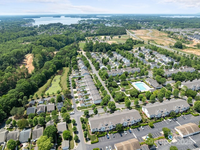 aerial view featuring a water view and a residential view
