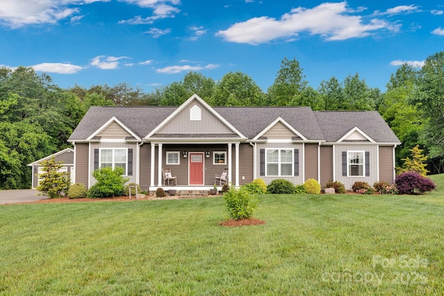 2853 Mathis Church Rd, Catawba, NC 28609 - view of front of home with a front lawn, a porch, board and batten siding, and roof with shingles
